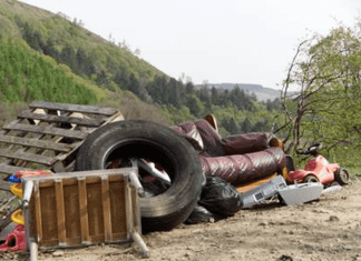 Householders in West Wales urged not to fall foul of new regulations by checking who is taking their waste