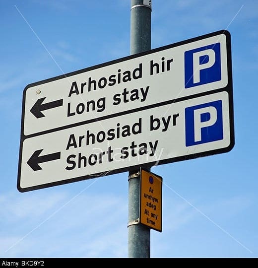 A Bilingual welsh and english sign for short stay car park, Wales UK