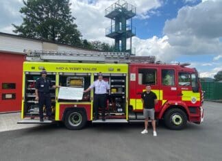 £500 raised for The Fire Fighters charity from the sale of Beanie Hats