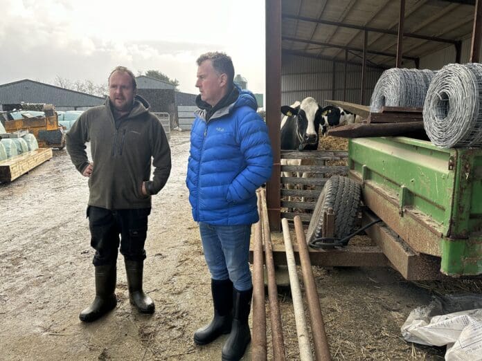 SCC-farmer-member-Sion-Hughes-showing-Nigel-Owens-around-his-farm-in-Criccieth-low-res.jpg
