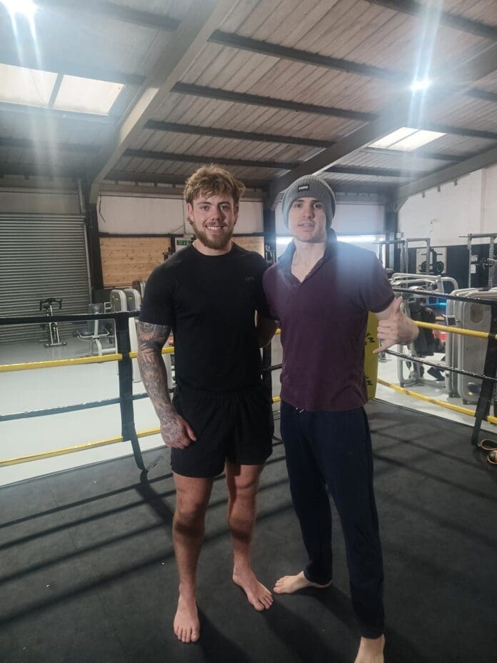 MMA-fighters-Kingsley-Powell-left-and-Jonny-Mills-Jr.jpg