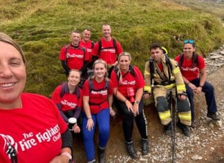 Firefighter raises over £500 climbing Welsh three peaks in full kit
