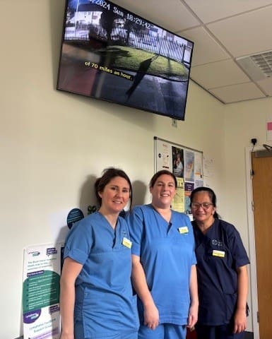 Chemotherapy-Day-Unit-staff-with-one-of-the-new-TVs.jpg