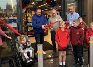New Tesco Express store opens in Tumble – with a little help from a local rugby hero